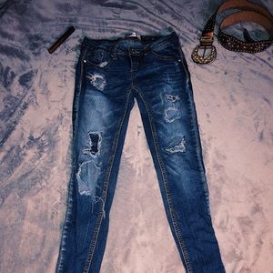 Lower waist skinny jeans with holes